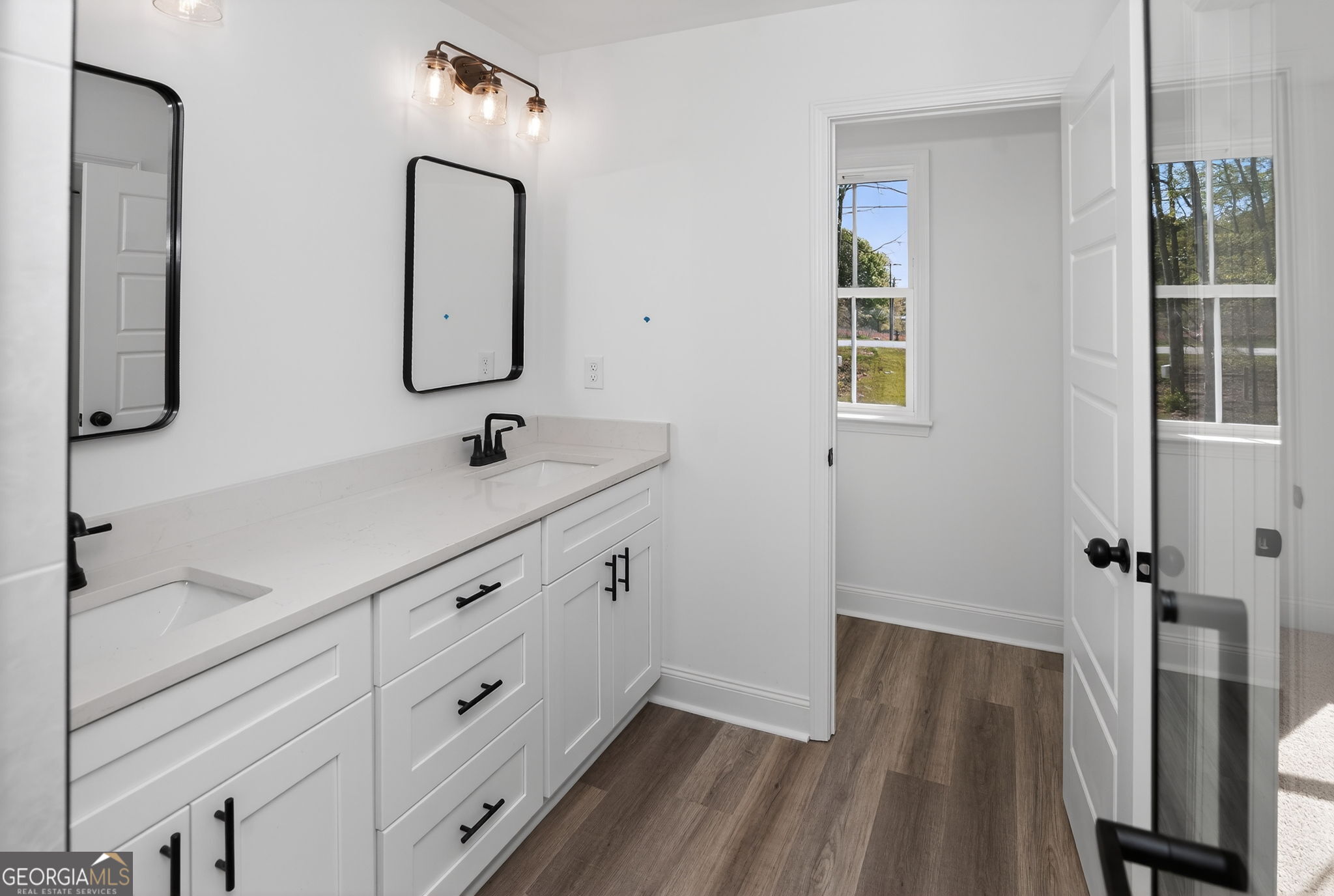 1229 Chappell Mill Road Jackson, GA 30233 - Photo 54 of 55 a bathroom with a sink and a mirror