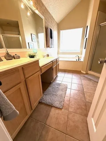 a bath tub sitting next to a window