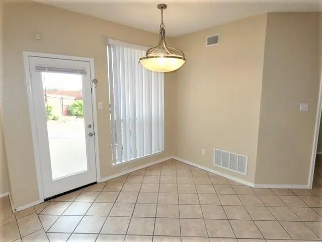 a view of an entryway with a window