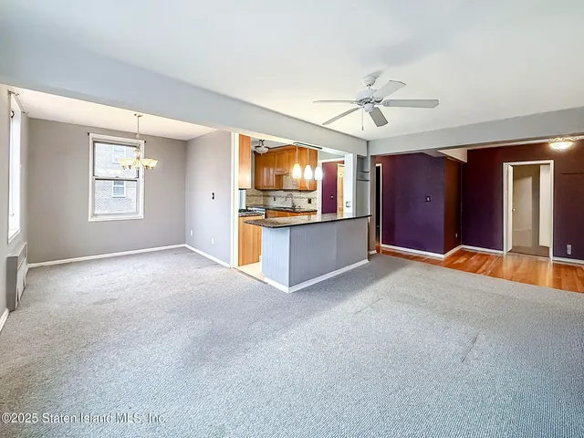 a view of kitchen and windows