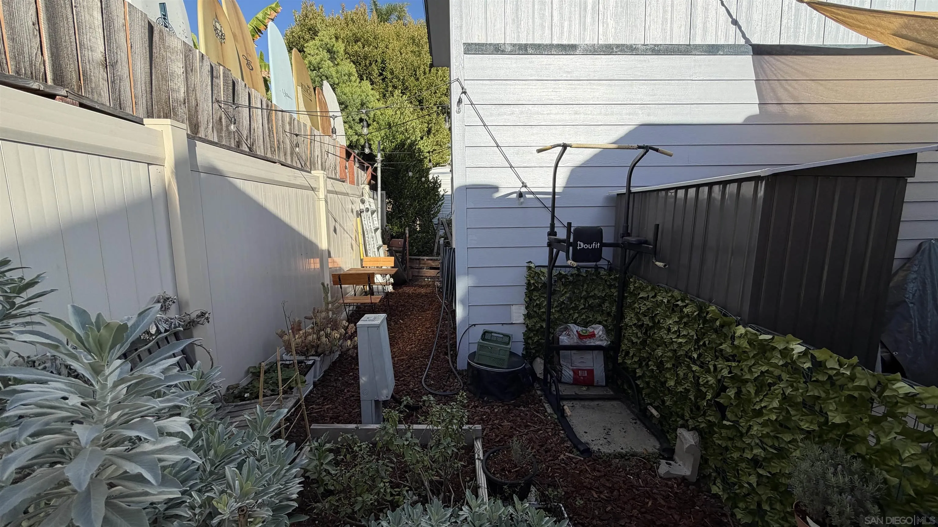 1549 North Vulcan Avenue, Unit 82 Encinitas, CA 92024 - Photo 28 of 32 a view of a house with backyard and sitting area
