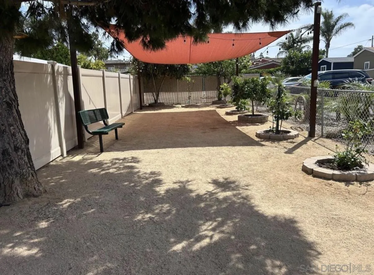 1549 North Vulcan Avenue, Unit 82 Encinitas, CA 92024 - Photo 30 of 32 a view of a backyard