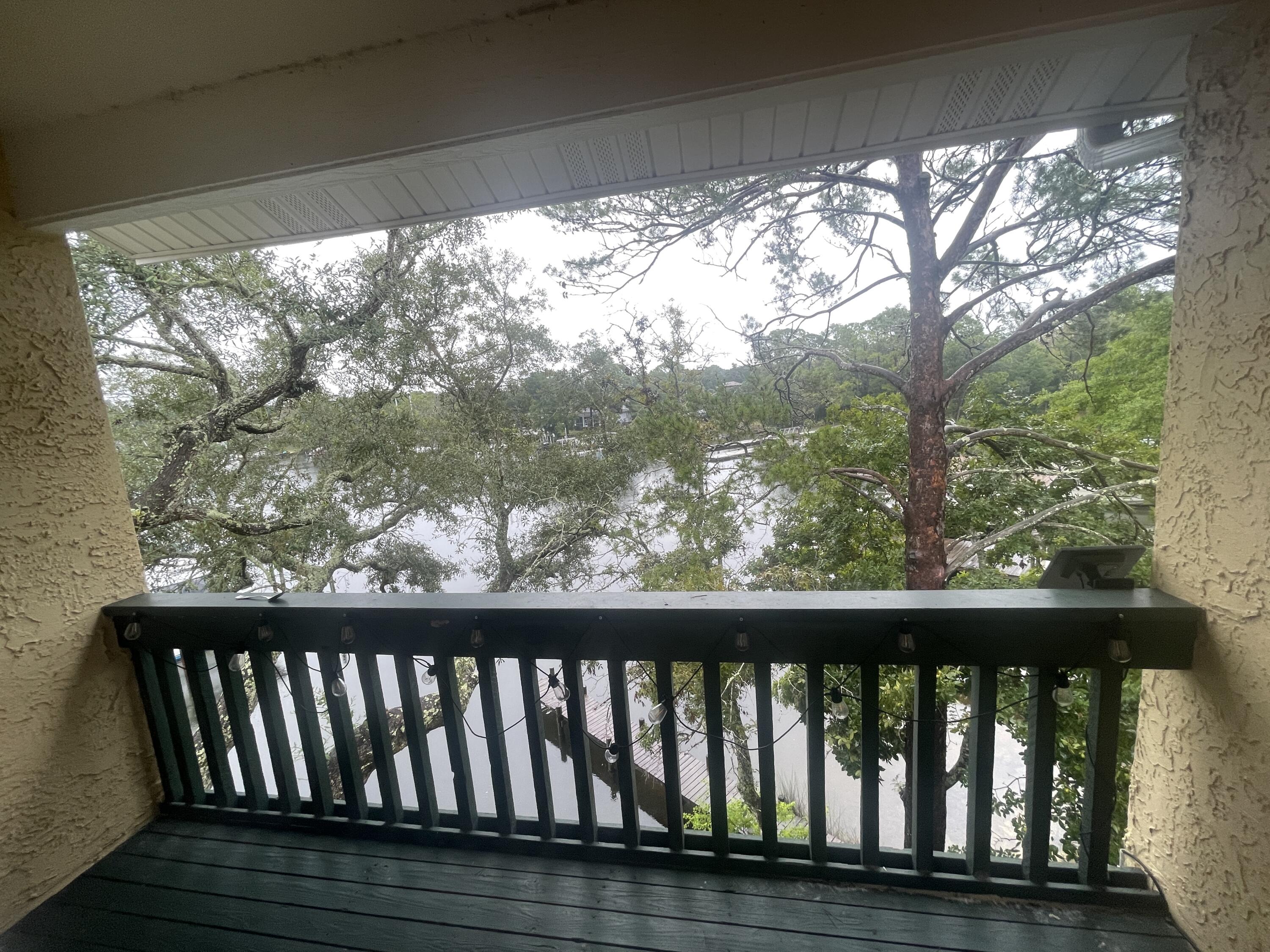 300 Yacht Club Drive, Unit 18A Niceville, FL 32578 - Photo 7 of 7 a view of balcony with wooden floor