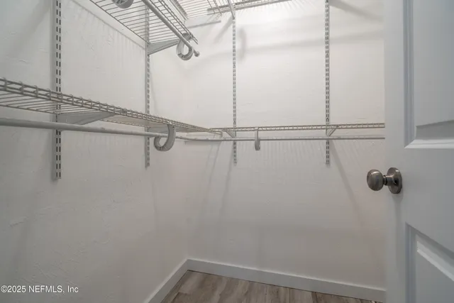 a view of a room with racks on the wall