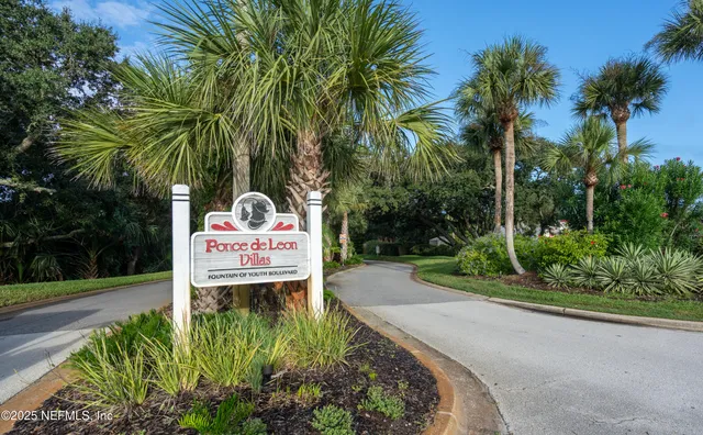 a sign on the side of the road