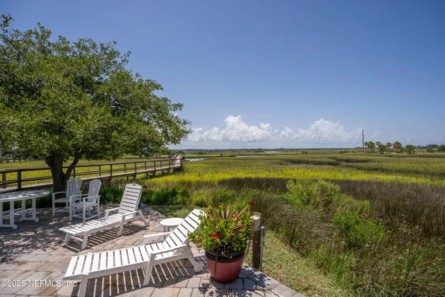 a view of a terrace with chairs