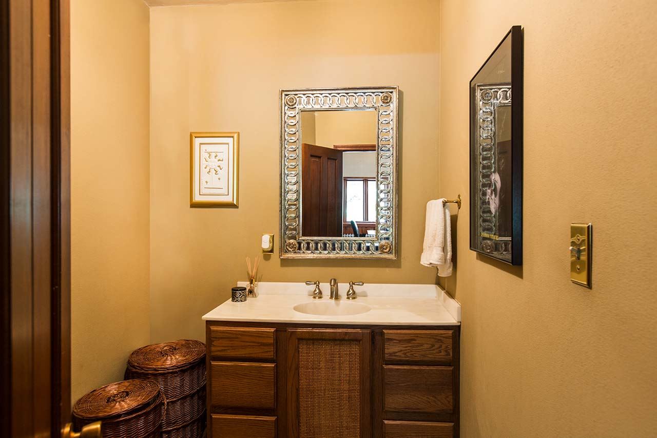 3604 Spring Creek Road Rockford, IL 61107 - Photo 13 of 24 a bathroom with a sink and a mirror