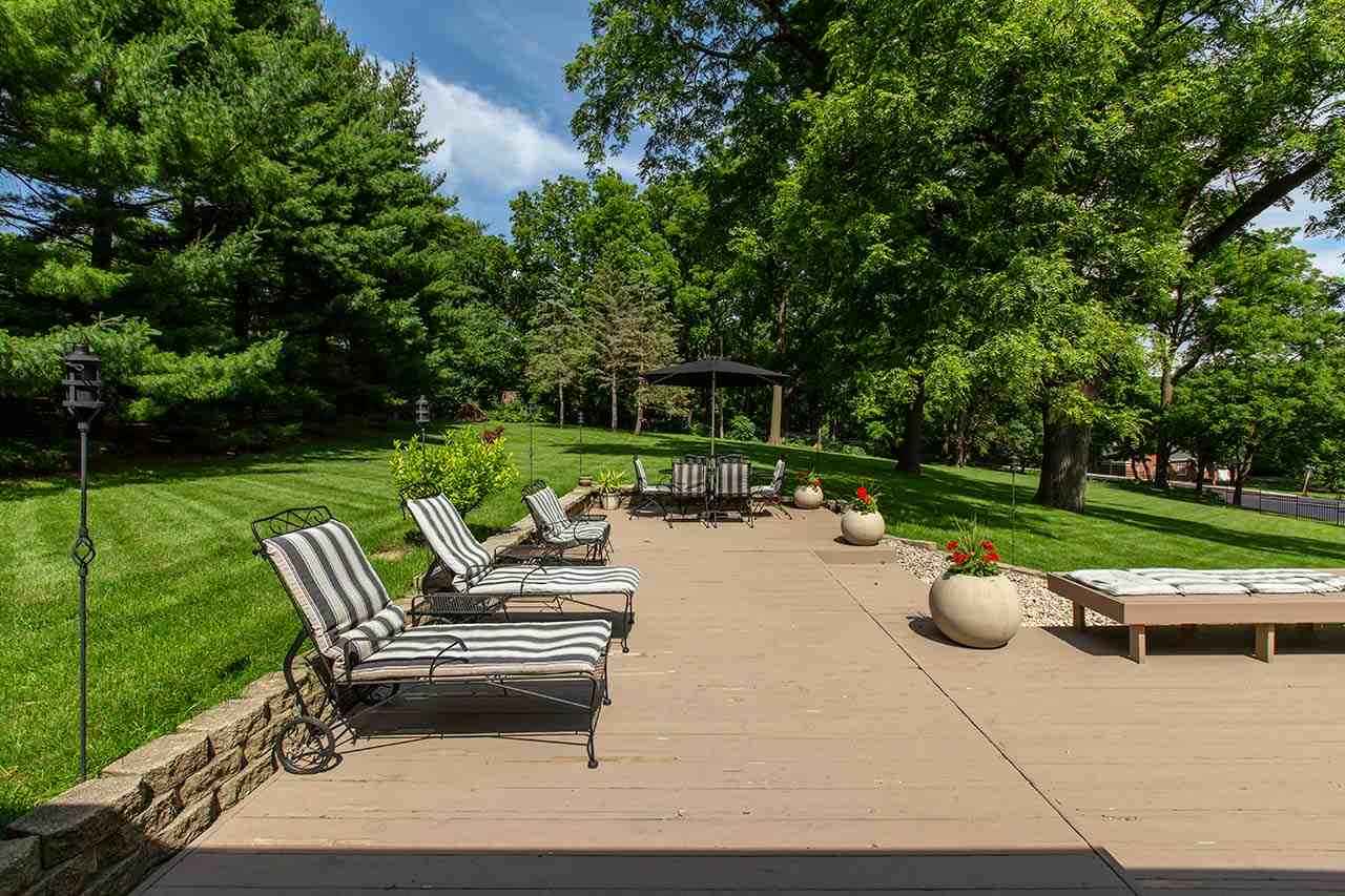 3604 Spring Creek Road Rockford, IL 61107 - Photo 23 of 24 a view of a patio with chairs and a table