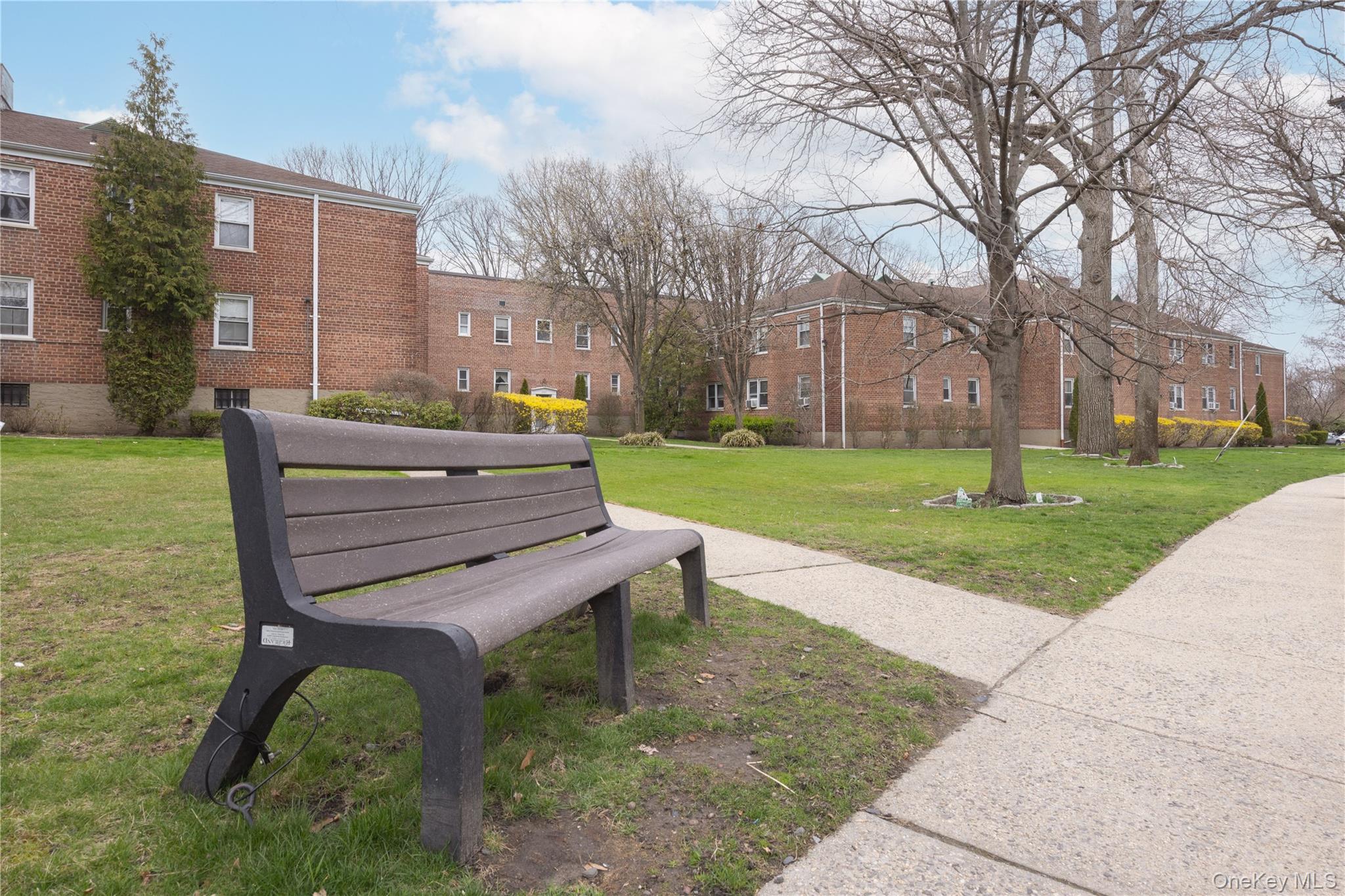 2303 Palmer Avenue, Unit F New Rochelle, NY 10801 - Photo 15 of 22 Surrounding community with a residential view and a yard