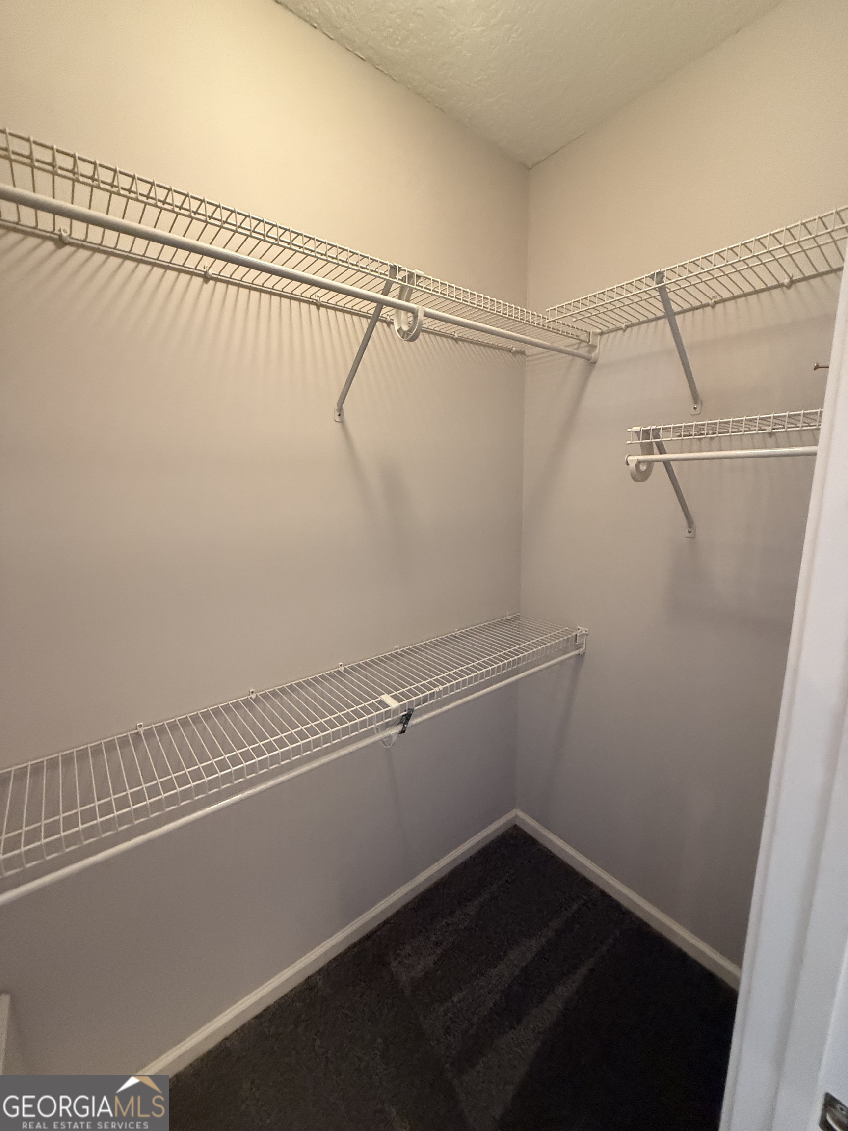 1403 Tanager Trail St. Marys, GA 31558 - Photo 20 of 24 a view of a room with racks on the wall
