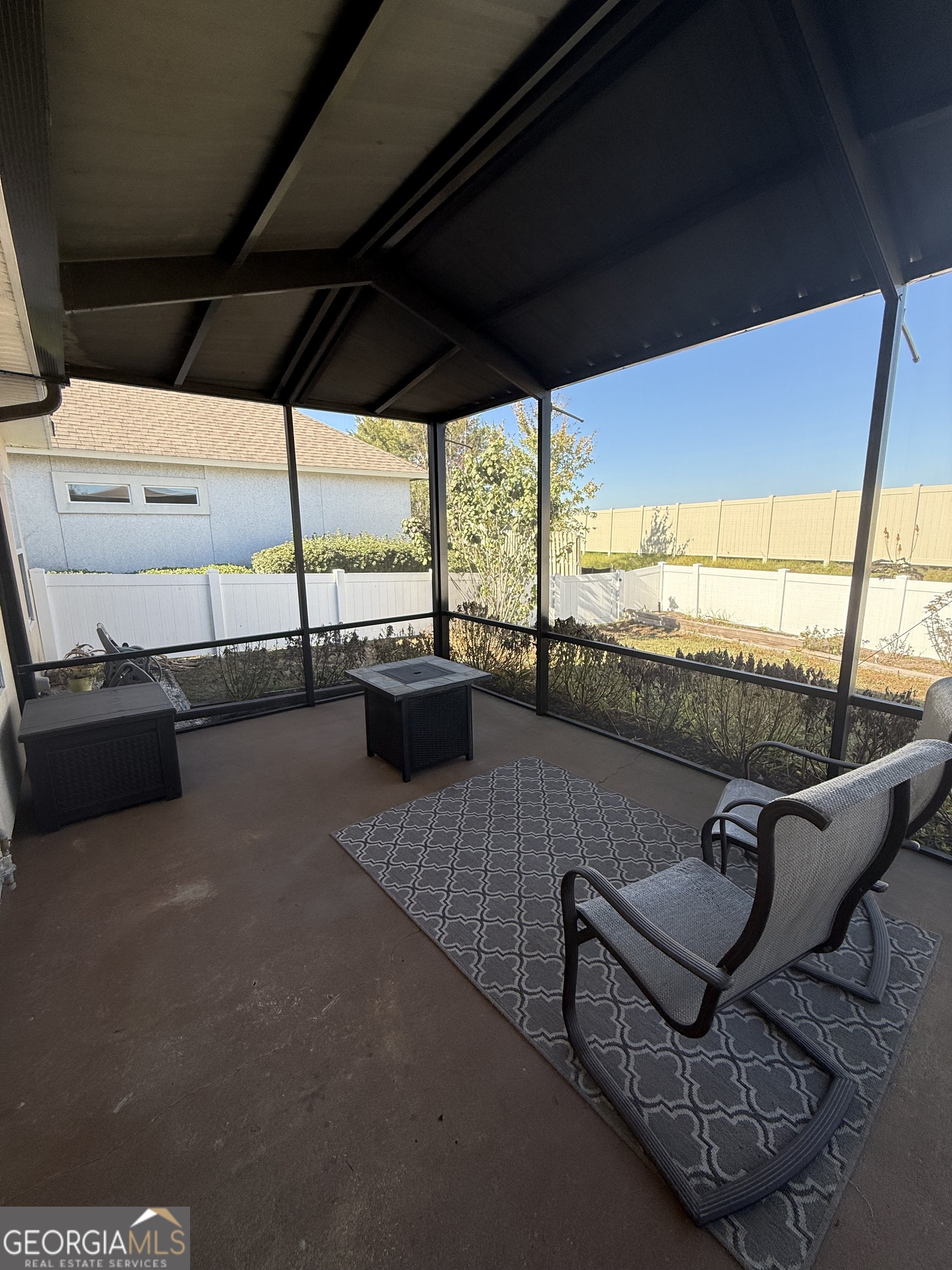 1403 Tanager Trail St. Marys, GA 31558 - Photo 23 of 24 a roof deck with couch and chairs