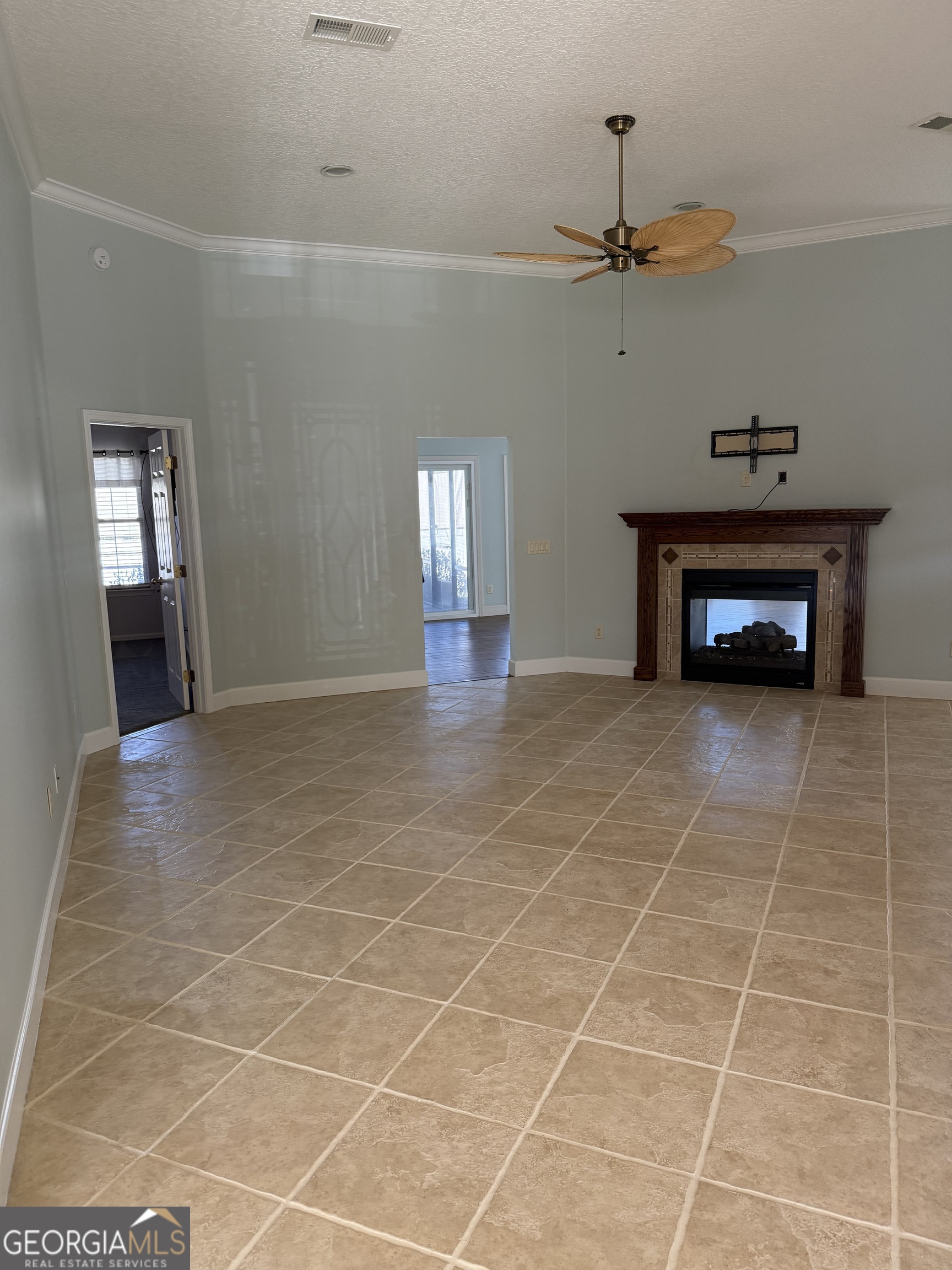1403 Tanager Trail St. Marys, GA 31558 - Photo 4 of 24 a view of an empty room with a window