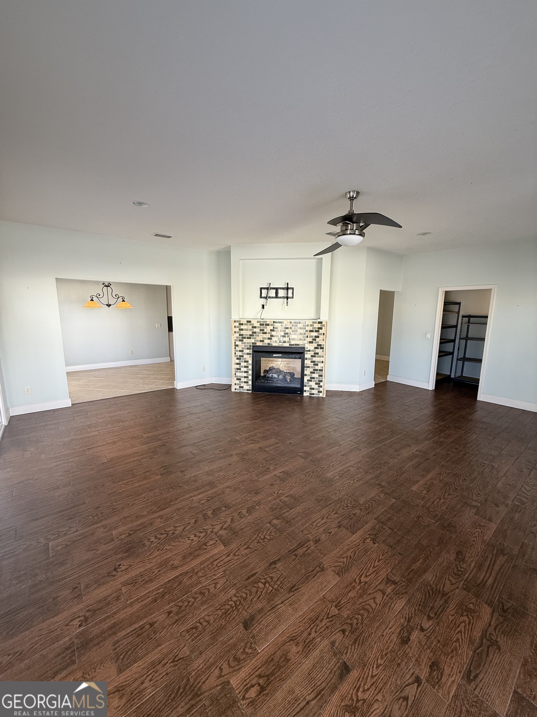1403 Tanager Trail St. Marys, GA 31558 - Photo 7 of 24 a view of empty room with furniture and a ceiling fan