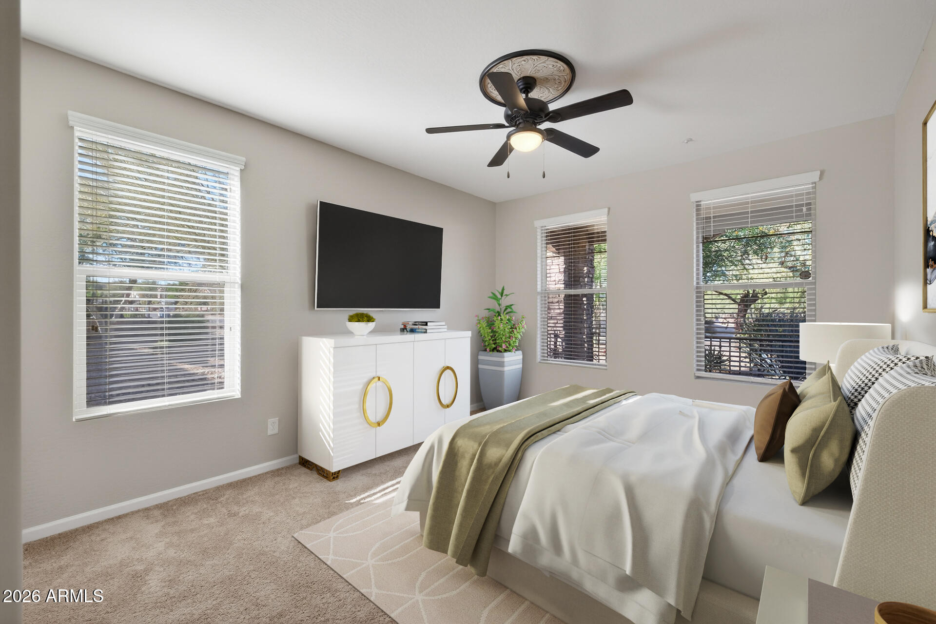 17963 East Silver Sage Lane Rio Verde, AZ 85263 - Photo 24 of 75 a bedroom with a bed a flat tv screen and a window
