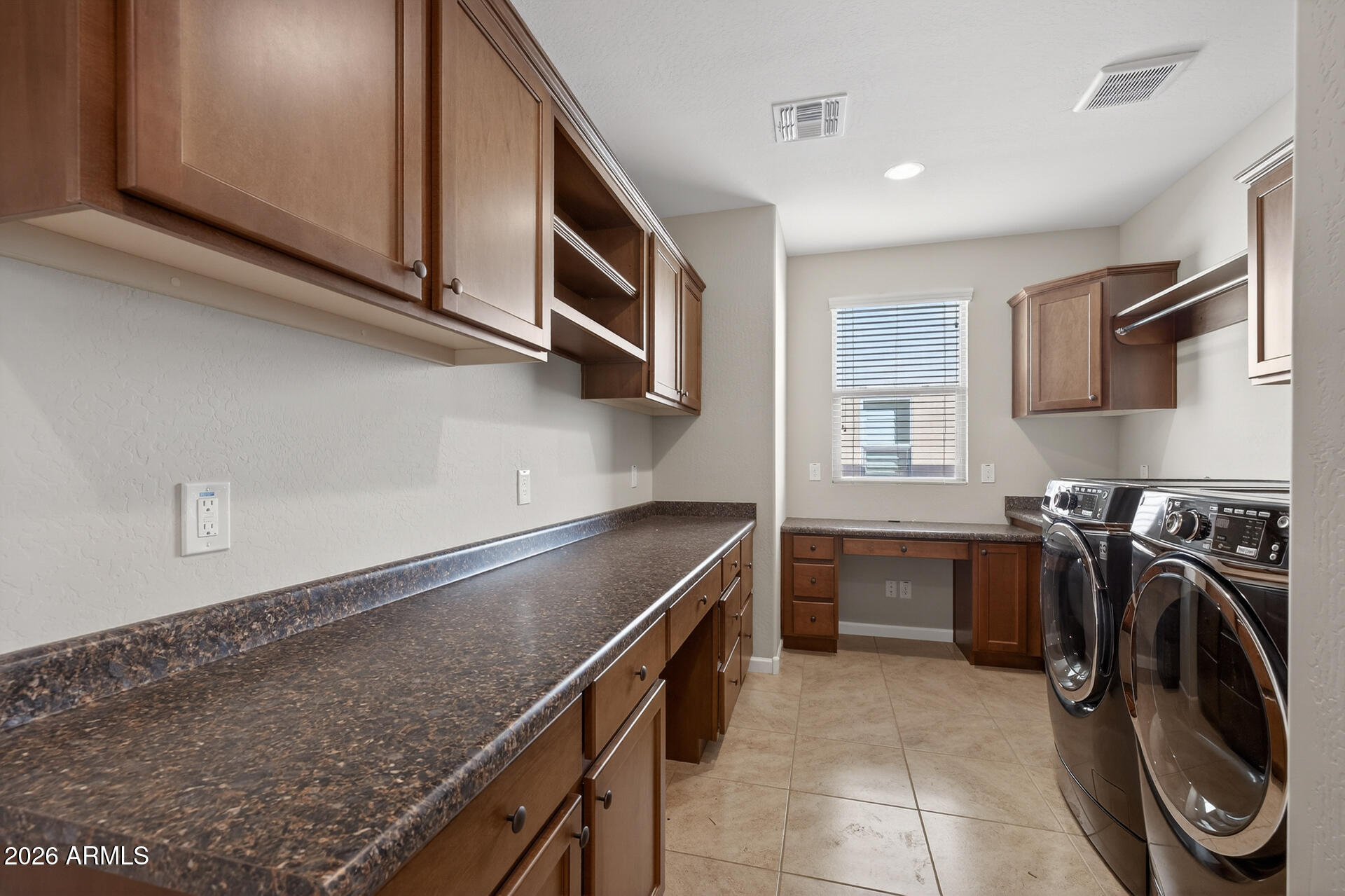 17963 East Silver Sage Lane Rio Verde, AZ 85263 - Photo 26 of 75 a kitchen with a stove microwave and a sink