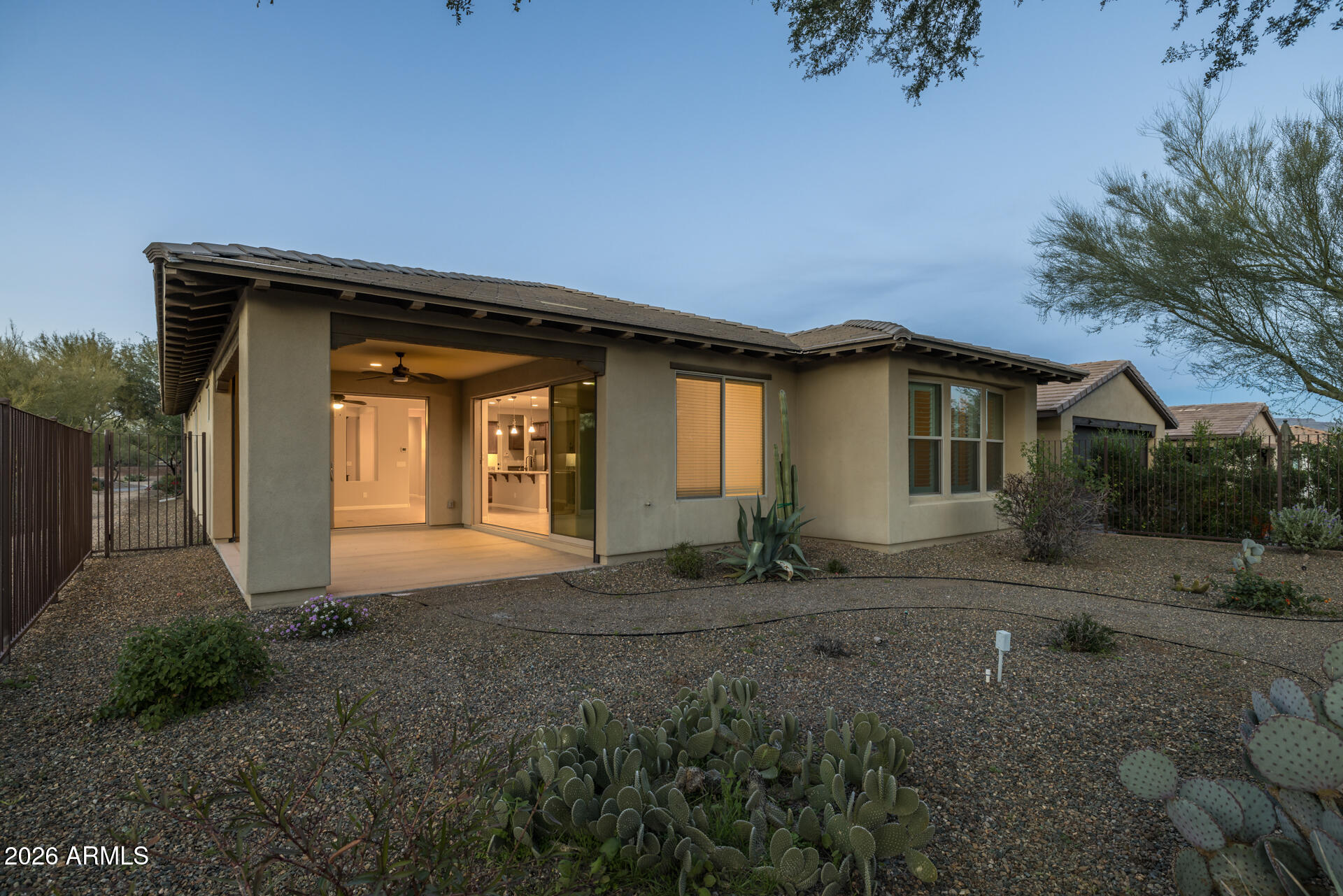 17963 East Silver Sage Lane Rio Verde, AZ 85263 - Photo 32 of 75 a front view of a house with a yard