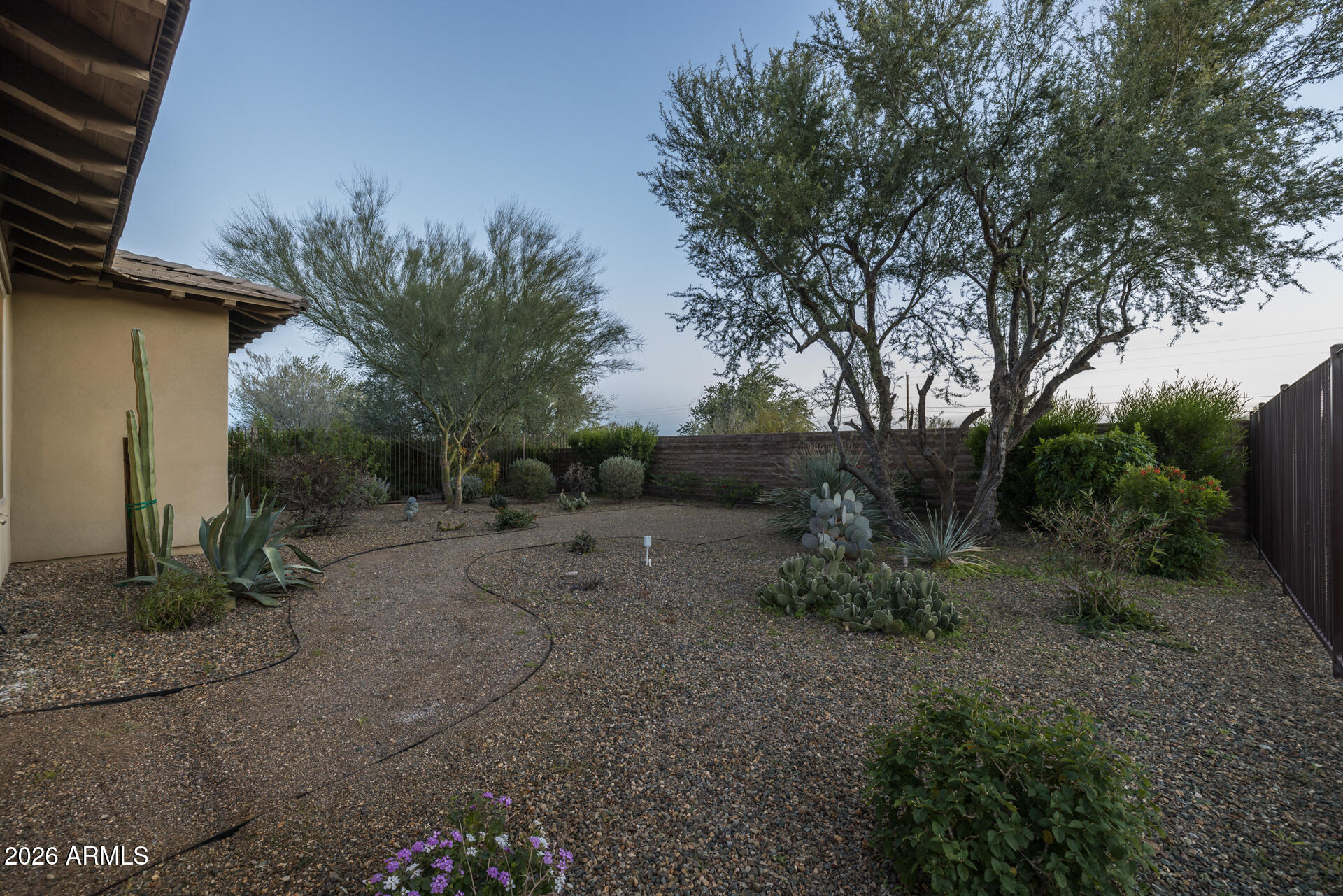 17963 East Silver Sage Lane Rio Verde, AZ 85263 - Photo 37 of 75 a backyard of a house with lots of green space