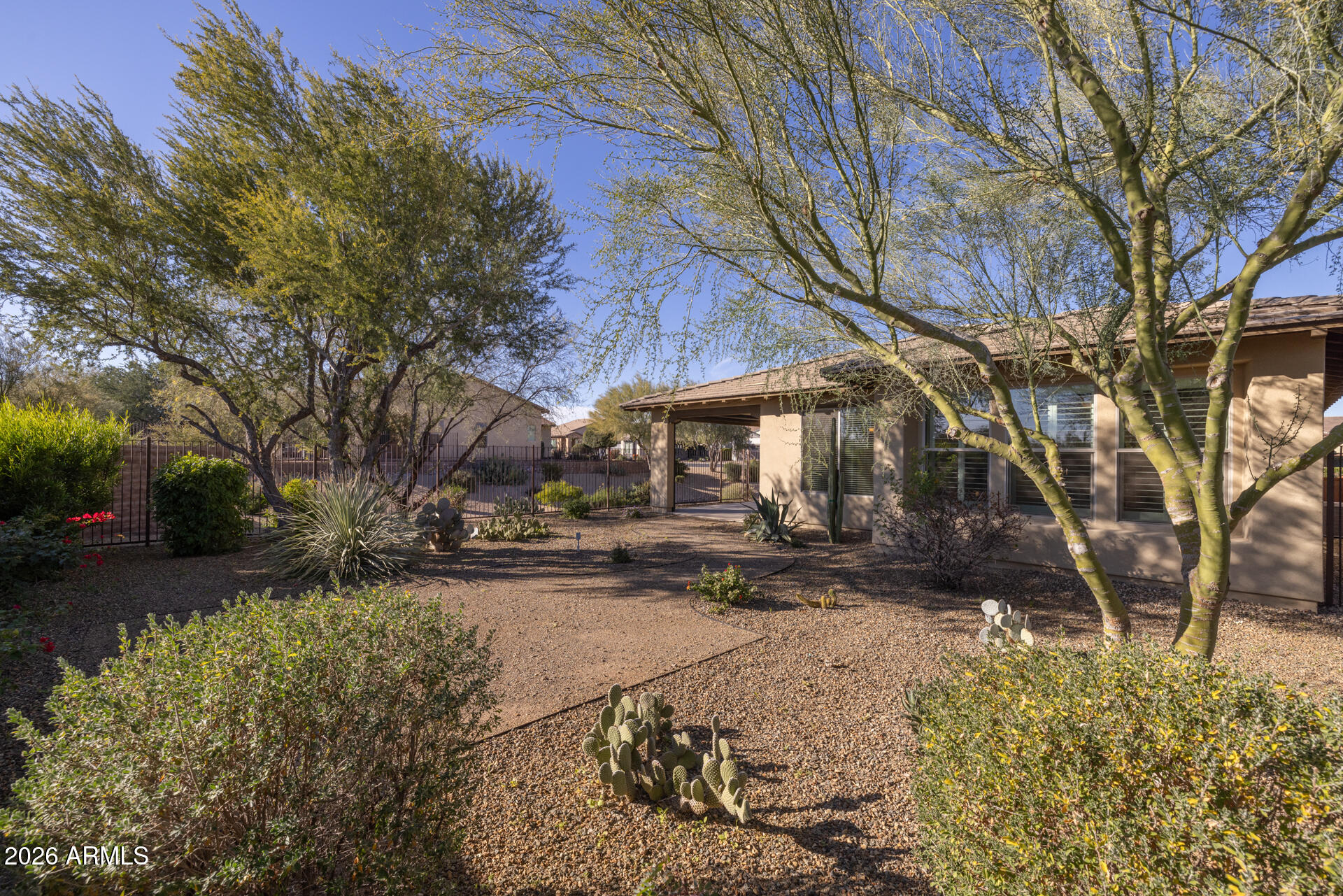 17963 East Silver Sage Lane Rio Verde, AZ 85263 - Photo 43 of 75 a view of a yard covered with snow in front of house