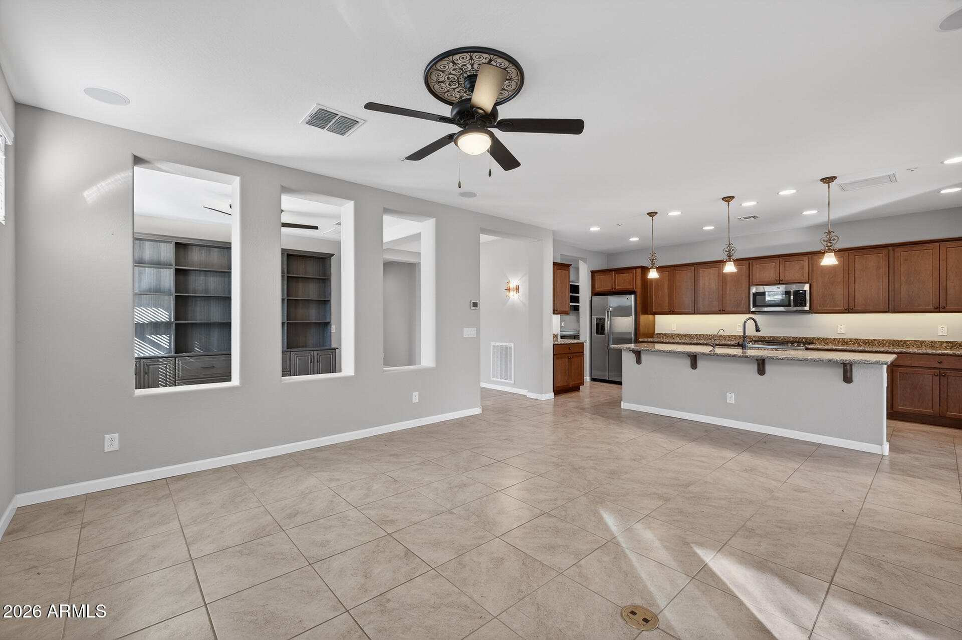 17963 East Silver Sage Lane Rio Verde, AZ 85263 - Photo 8 of 75 a view of kitchen with stainless steel appliances granite countertop cabinets and window
