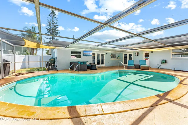 a room with lots of table and chairs