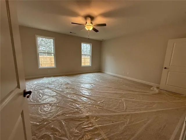 a front view of a house with a lake view