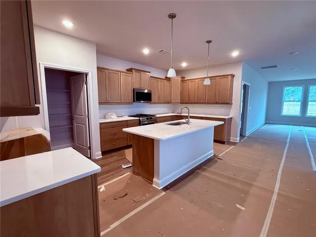 a living room with furniture dining table and a fireplace