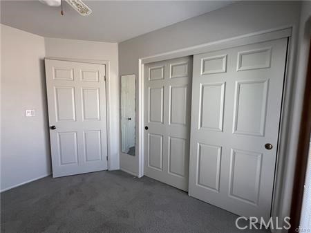 6818 Kittyhawk Avenue Hesperia, CA 92345 - Photo 12 of 14 an empty room with windows