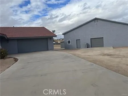 a house with yard in front of it