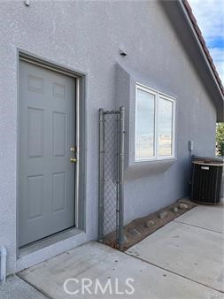 6818 Kittyhawk Avenue Hesperia, CA 92345 - Photo 3 of 14 a view of entryway with front door