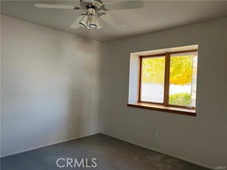 6818 Kittyhawk Avenue Hesperia, CA 92345 - Photo 10 of 14 an empty room with a window