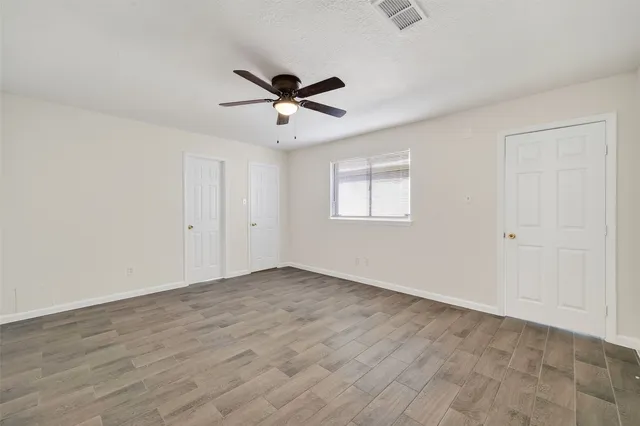 a bathroom with a sink a vanity and a mirror