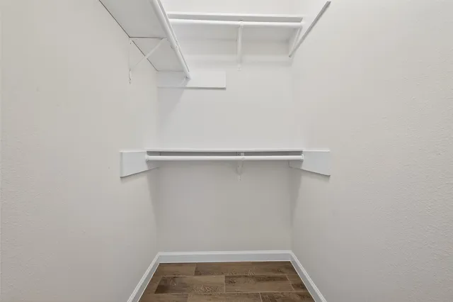 a view of a house with backyard and garden