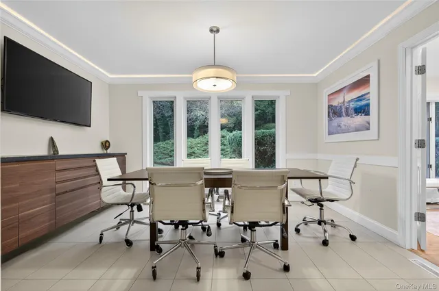 a view of a livingroom with furniture window and outside view