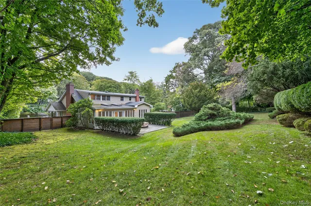 a view of a garden with a bench