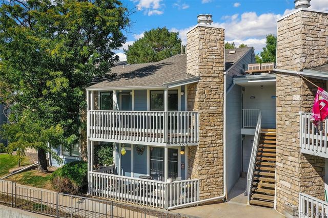a front view of a house with a porch