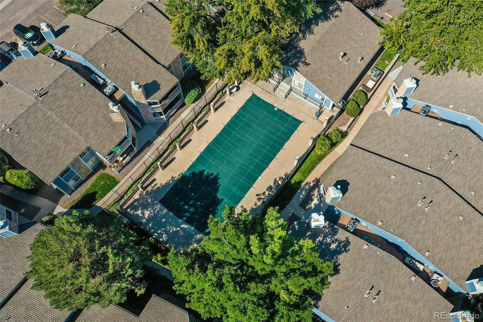 8335 Fairmount Drive, Unit 1202 Denver, CO 80247 - Photo 25 of 28 an aerial view of a house