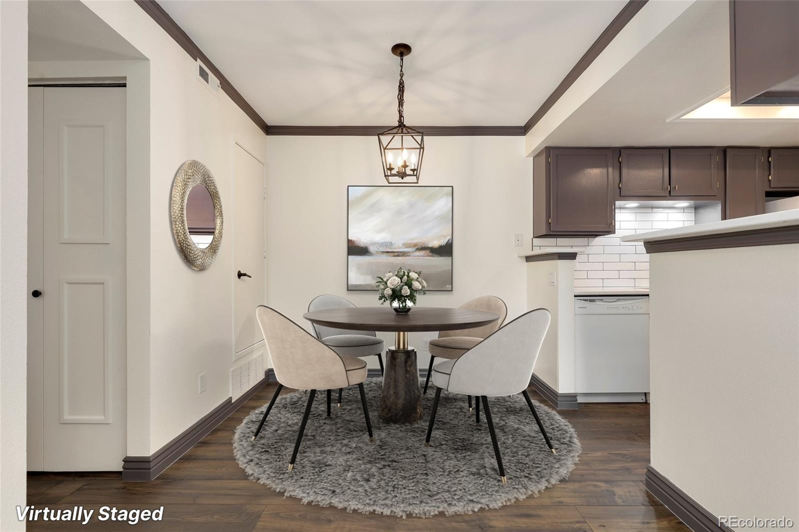 8335 Fairmount Drive, Unit 1202 Denver, CO 80247 - Photo 3 of 28 a view of a dining room with furniture window and wooden floor