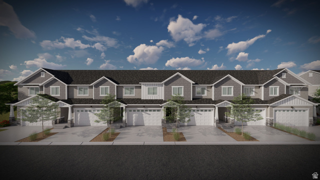 5243 Plum Lane, Unit 771 Mapleton, UT 84664 - Photo 1 of 4 Contemporary townhome facade featuring a blend of gray siding and white trim