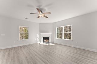 636 Bald Ridge Circle Demorest, GA 30535 - Photo 12 of 35 a view of an empty room with a window and fireplace
