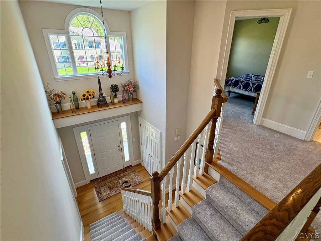7892 East Ridge Pointe Drive Manlius, NY 13066 - Photo 25 of 46 View of the foyer from the second floor landing.