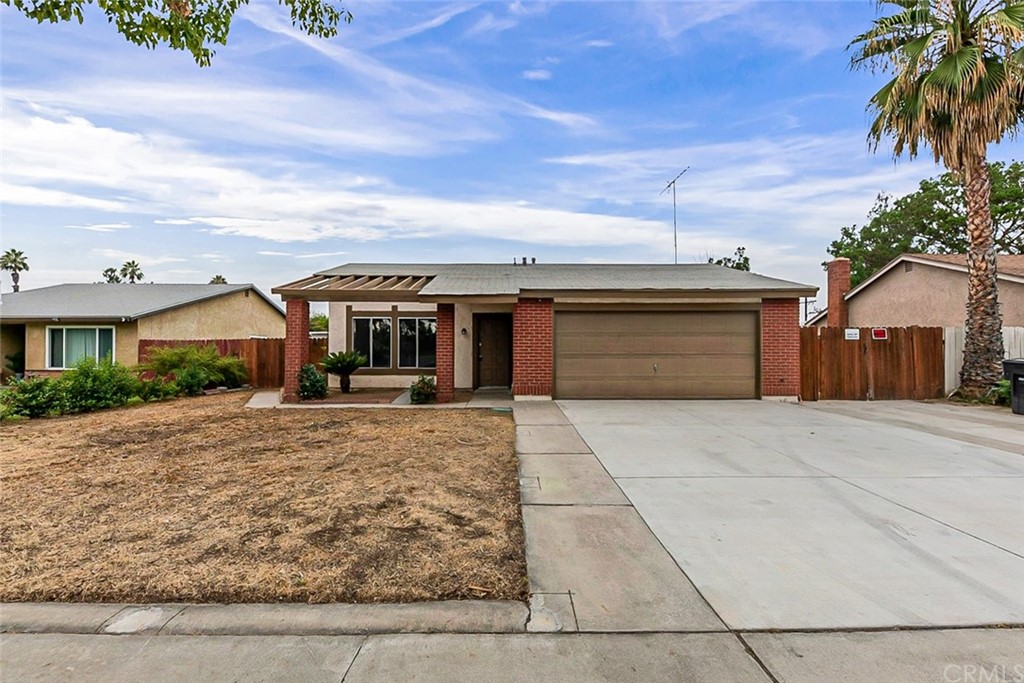 9655 Wichita Drive Riverside, CA 92503 - Photo 1 of 1 front view of a house with a yard