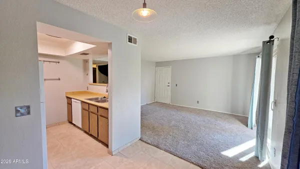 a view of kitchen and a sink