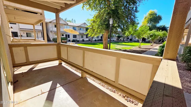 a view of a house with outdoor space and sitting area
