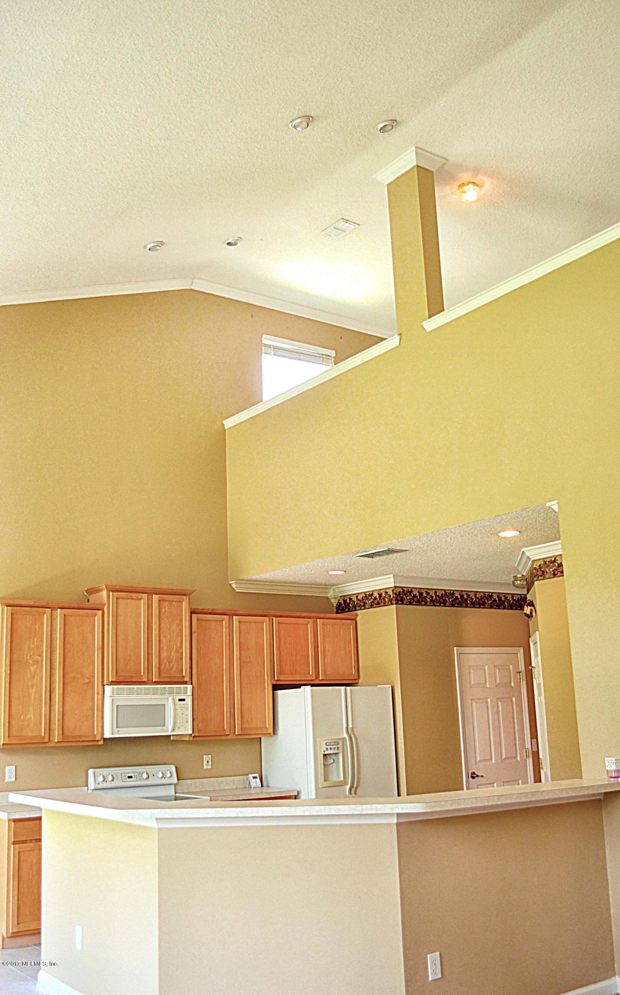 2101 Pond Spring Way Fleming Island, FL 32003 - Photo 17 of 26 kitchen balcony