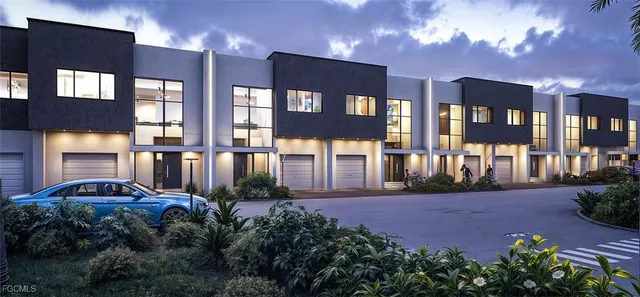 a view of a front of a house with a yard