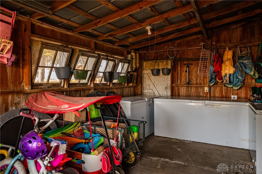 1599 Garringer Road Jamestown, OH 45335 - Photo 59 of 73 This rustic storage space features exposed beams and ample room for organization.