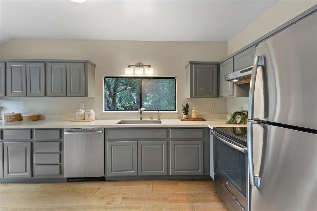 4 Farm Road Los Altos, CA 94024 - Photo 12 of 44 a kitchen with a sink appliances and cabinets