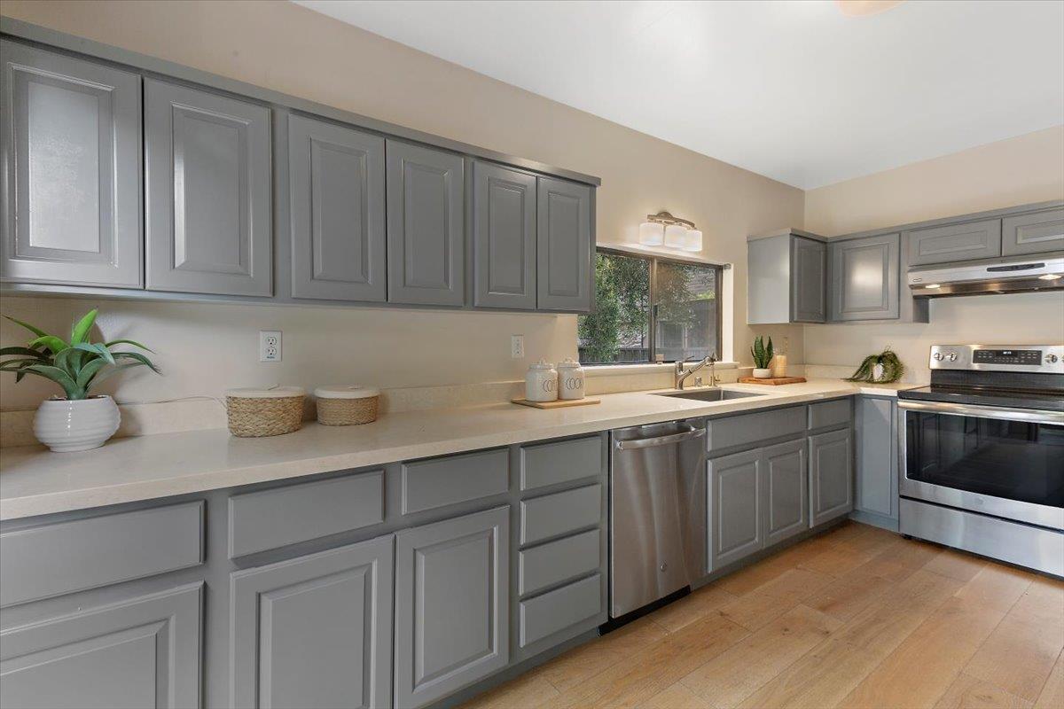 4 Farm Road Los Altos, CA 94024 - Photo 13 of 44 a kitchen with sink and cabinets