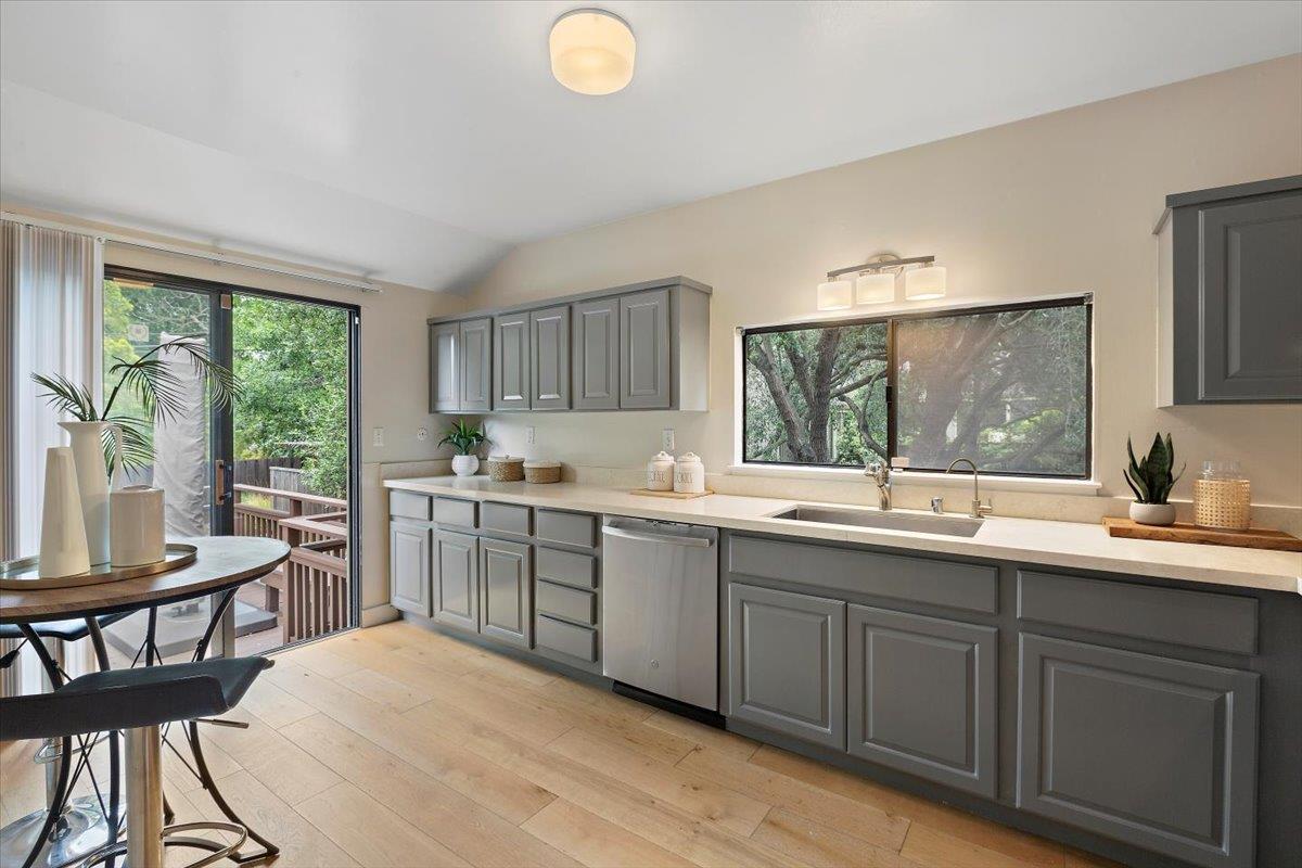 4 Farm Road Los Altos, CA 94024 - Photo 15 of 44 a kitchen with sink cabinets and wooden floor