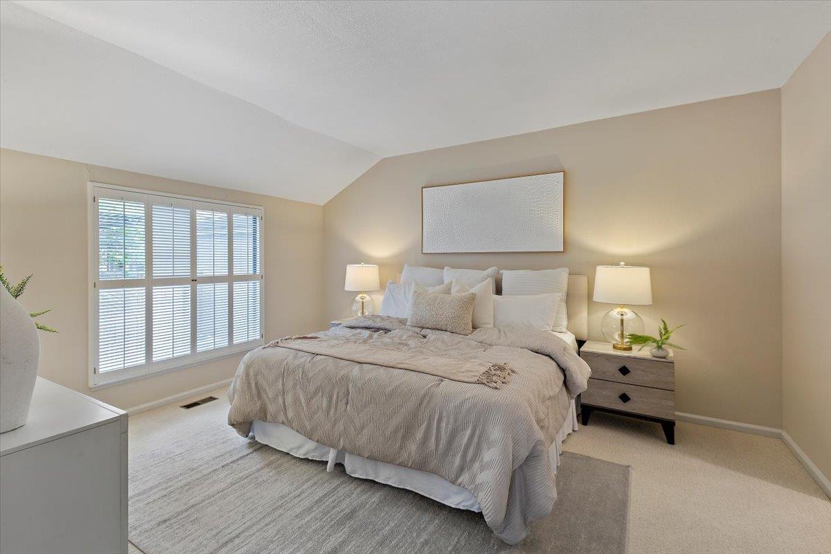 4 Farm Road Los Altos, CA 94024 - Photo 23 of 44 a bedroom with a bed and a large window